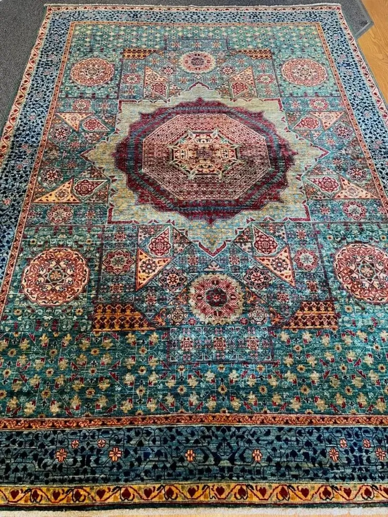Vibrant Oriental rug with intricate medallion pattern, professionally cleaned by Carpet Cleaning Group in Chicago